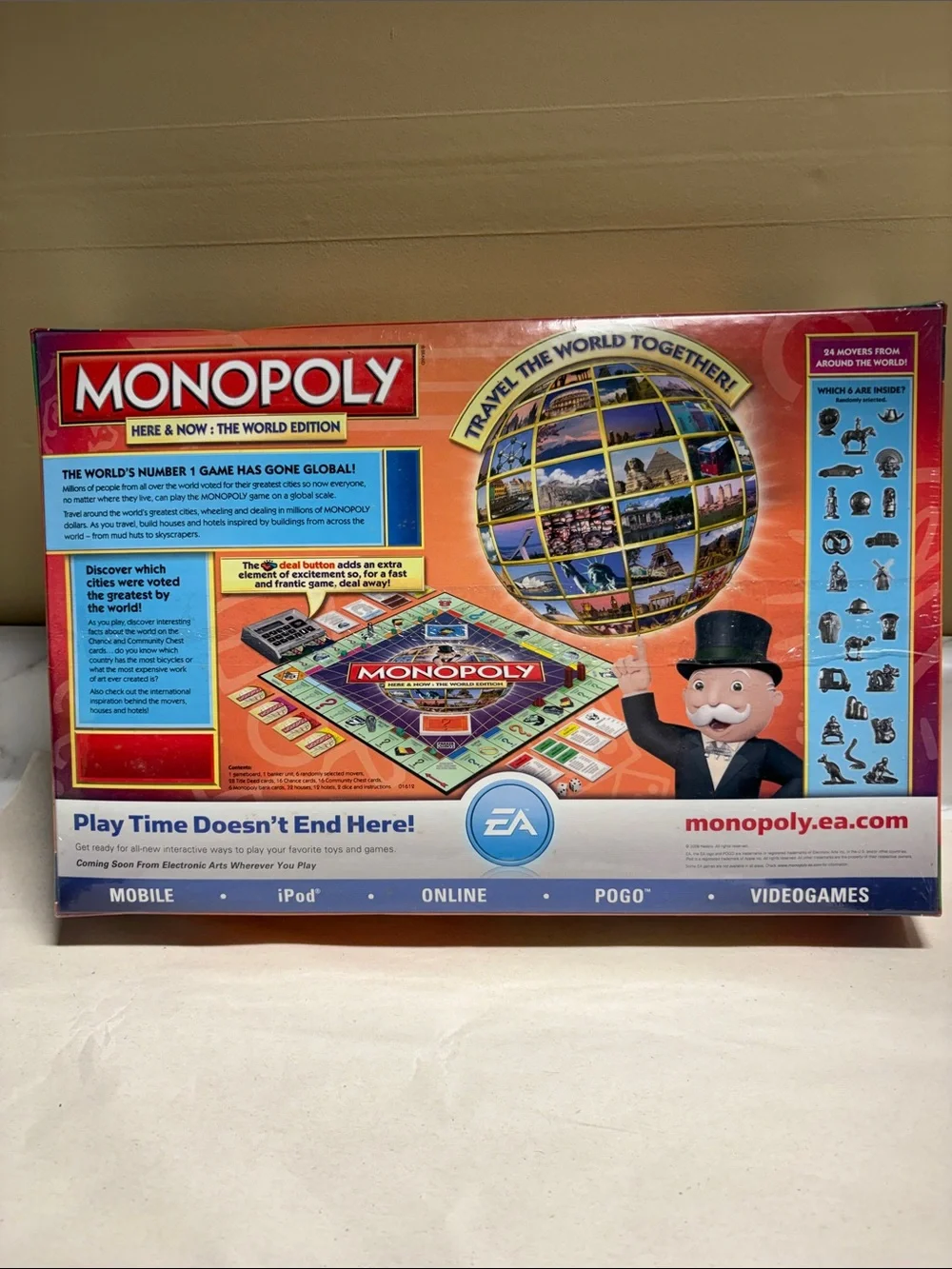 Monopoly Here & Now: The World Edition Board Game - Classic Red Box